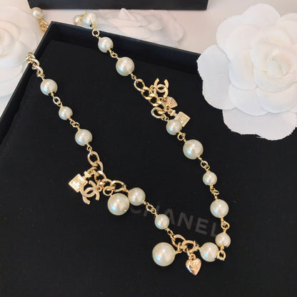 CHN78   Perfume bottle Pearl necklace,2 used necklace (can also be wound 2 times as a bracelet)  Jewelry